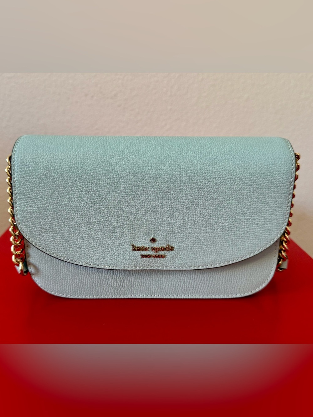 Kaye Spade almost new aquamarine/dewy blue color leather crossbody